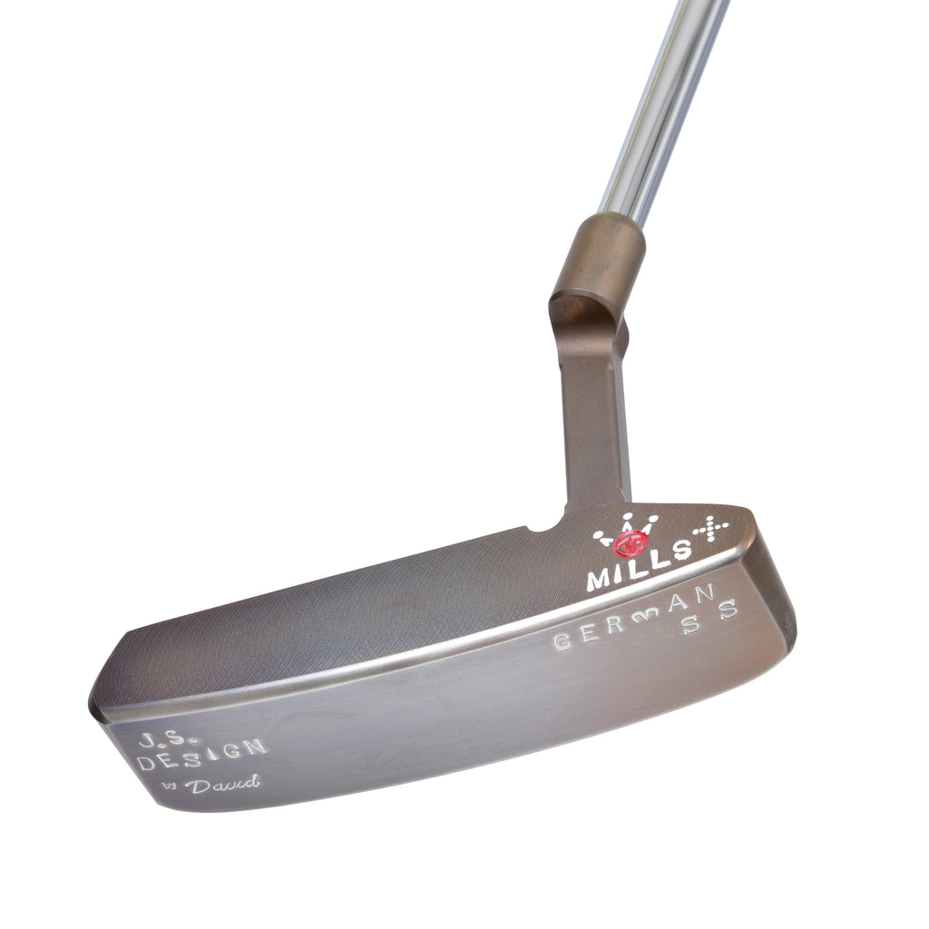 Heel-side three-quarter view of the SGSS Trad II Dark Flamed face and lower sole stamping